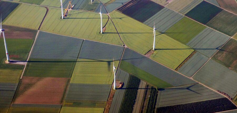 wind turbines to portray "advancing distributed energy resources & enhancing meter data management" blog post