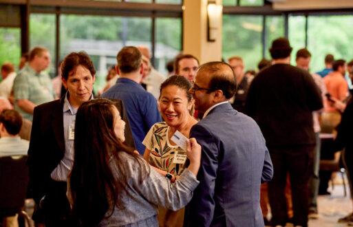 Customers enjoying the Drinks & Demos event at INFOCUS 2025