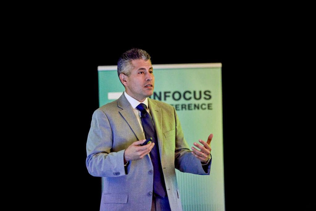Eliecer Eli Viamontes speaking at PCI Energy Solutions INFOCUS 2025 Conference