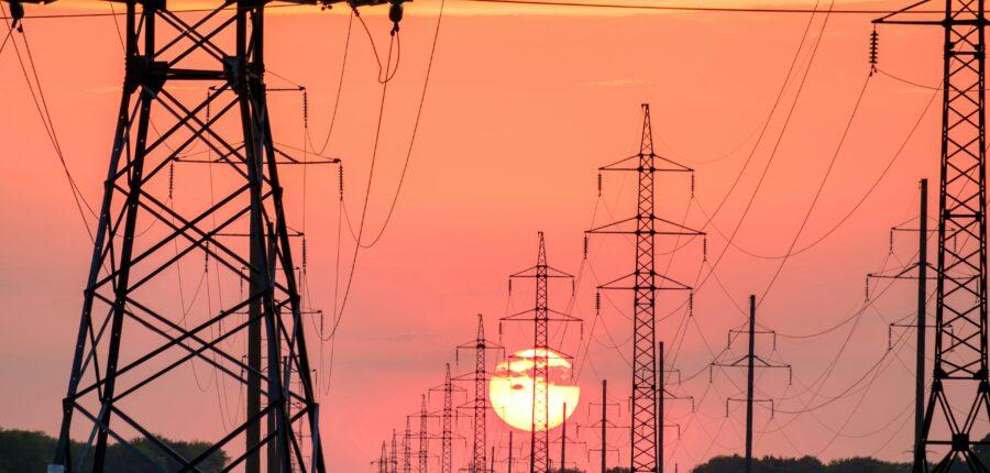 Transmission lines at sunset