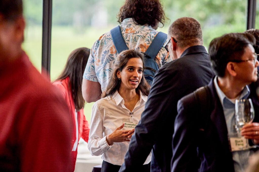 kowsalya muralid of pci energy solutions talking to customers at infocus conference 2025